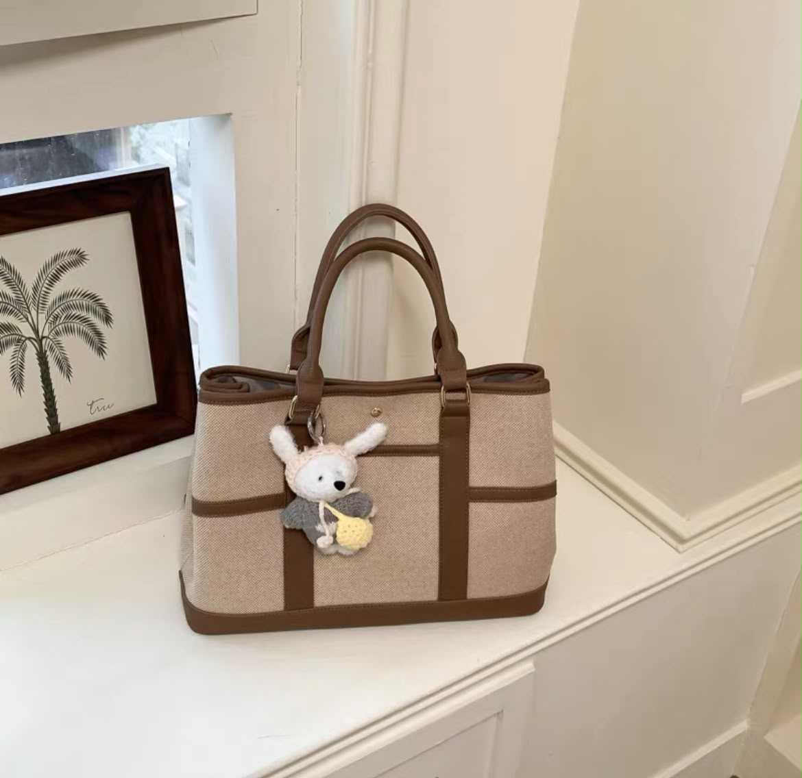 Stylish Canvas Tote Bag with Charm Accent