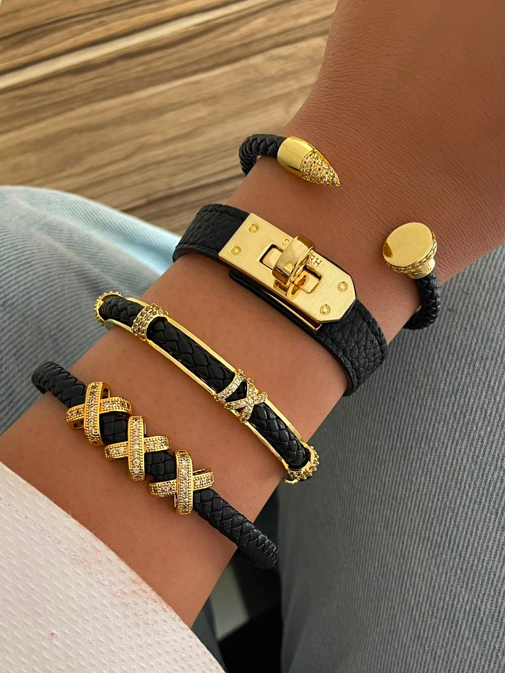 Elegant Black Leather & Gold-Plated Bracelet Collection