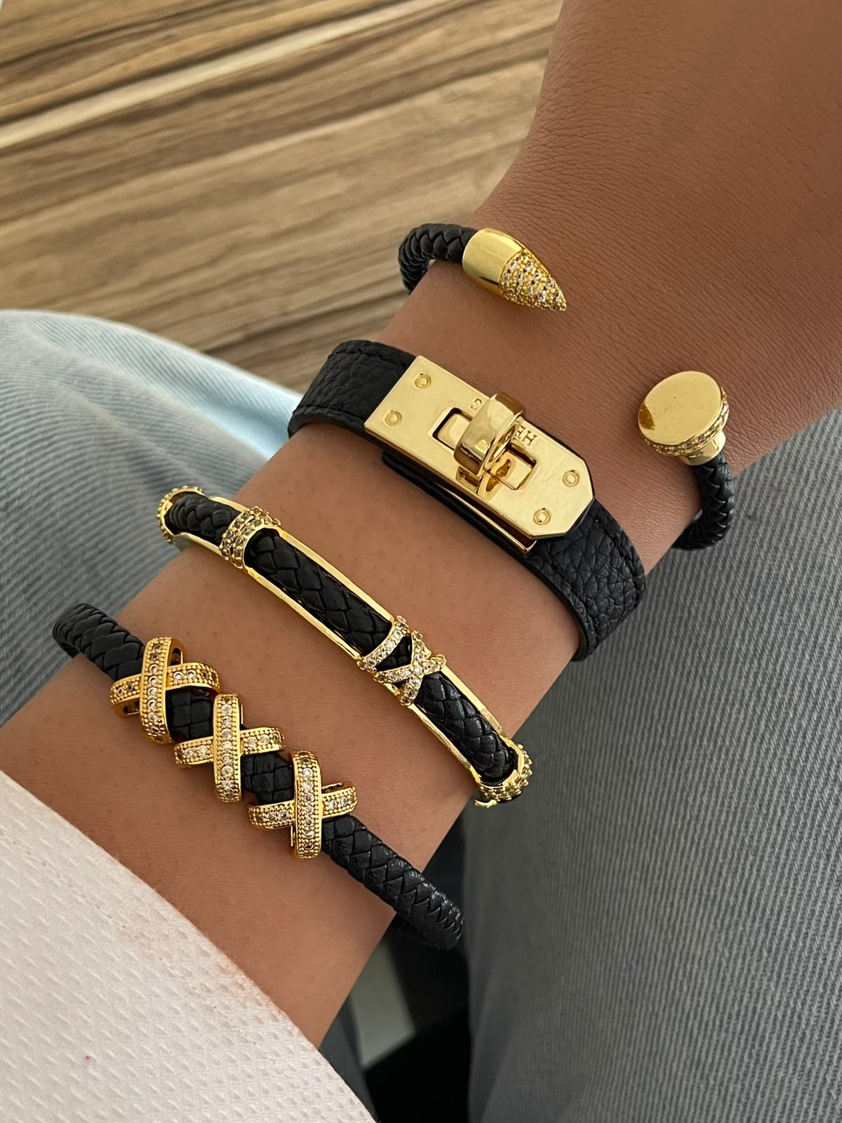 Elegant Black Leather & Gold-Plated Bracelet Collection